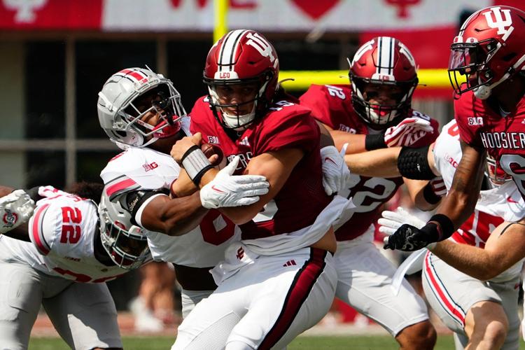 Sep 2, 2023; Bloomington, Indiana, USA; Ohio State Buckeyes safety Sonny Styles (6) tackles Indiana Hoosiers quarterback Brendan